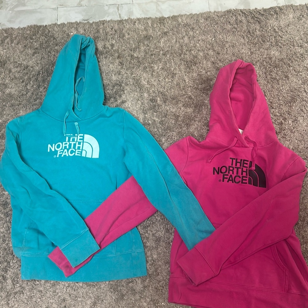 Blue and Pink North face hoodies
